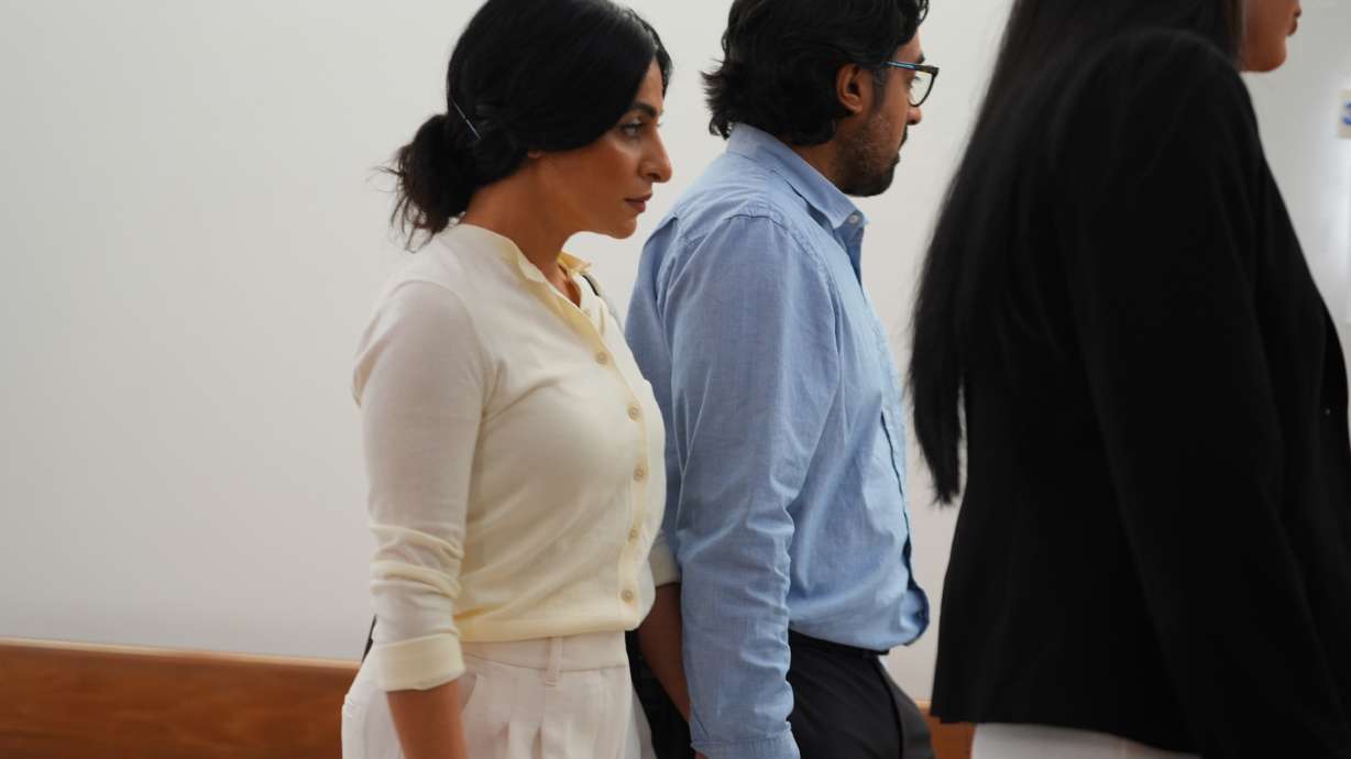 Nausheen Gilkar, left, and her husband Omar Ahmed arrive for a court hearing in Dallas, Tuesday.
