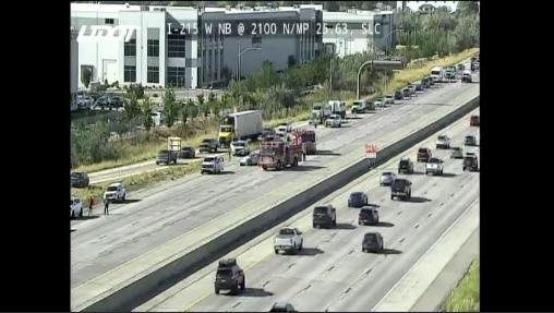 A crash on I-215 in Salt Lake City is pictured on Tuesday. The Utah Department of Public Safety released the names of two people killed.