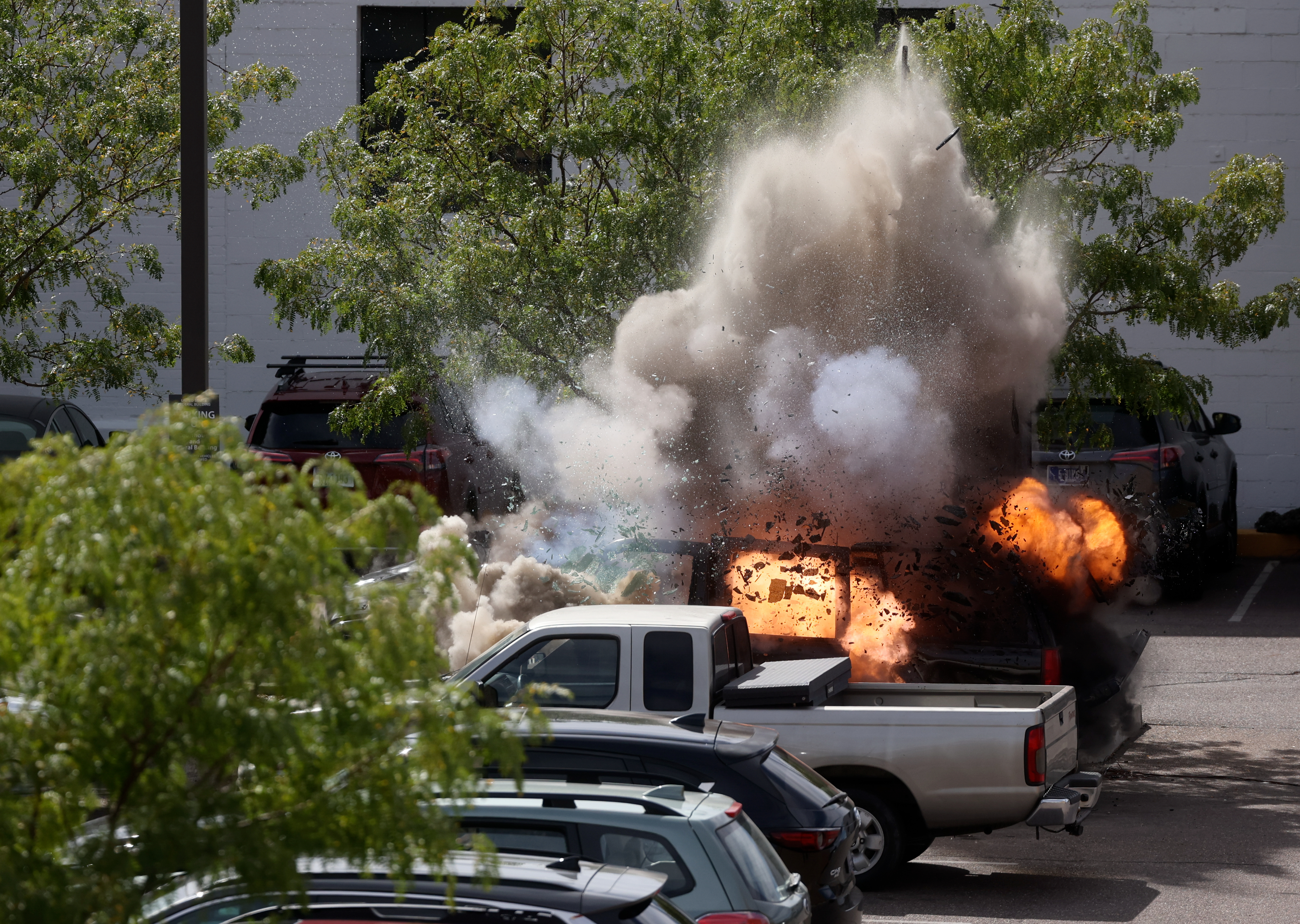 A car explodes on the set of “Marshals” in Ogden on Tuesday.