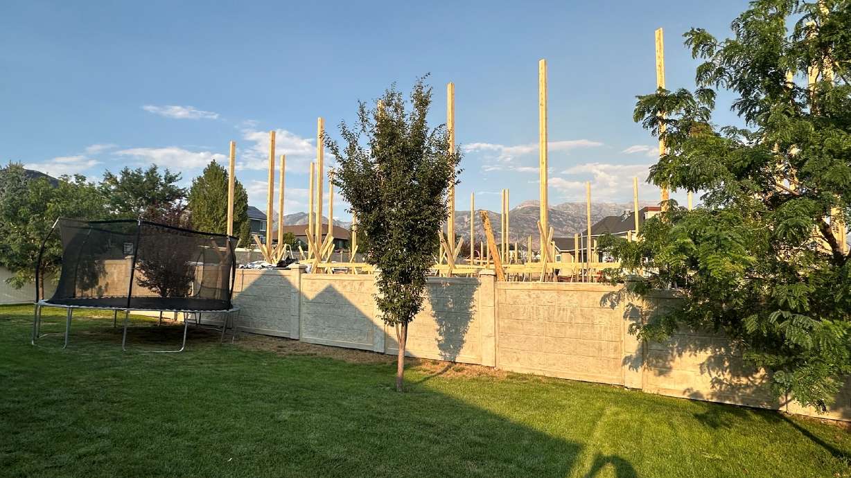 A controversial backyard construction project is pictured on Tuesday from Dale Stewart's backyard. A large backyard construction project rising behind homes right on the border of a Lehi and American Fork neighborhood is drawing sharp criticism from residents.