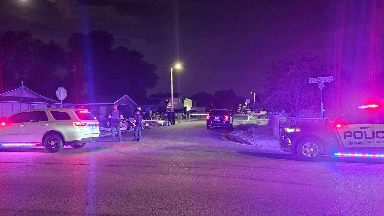 The scene of an alleged stabbing in West Valley is pictured on Tuesday. Police are searching for someone they say stabbed another person.