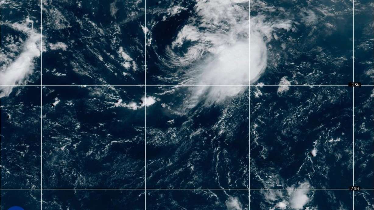 This NOAA satellite image taken at 11:21 a.m. EST on Wednesday, Aug. 12, 2026, shows Tropical Storm Cristobal in the Atlantic Ocean.