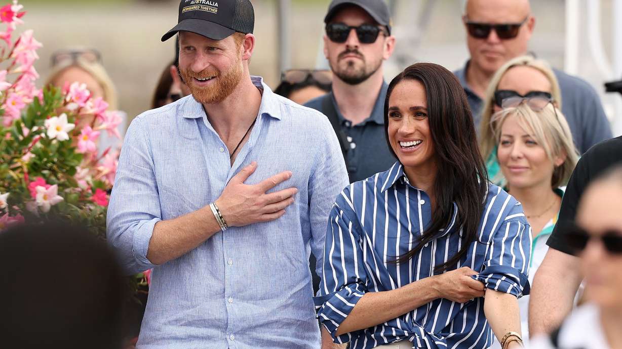 Prince Harry and Meghan, the Duchess of Sussex, greet the public in Australia on April 17 during a four-day visit.