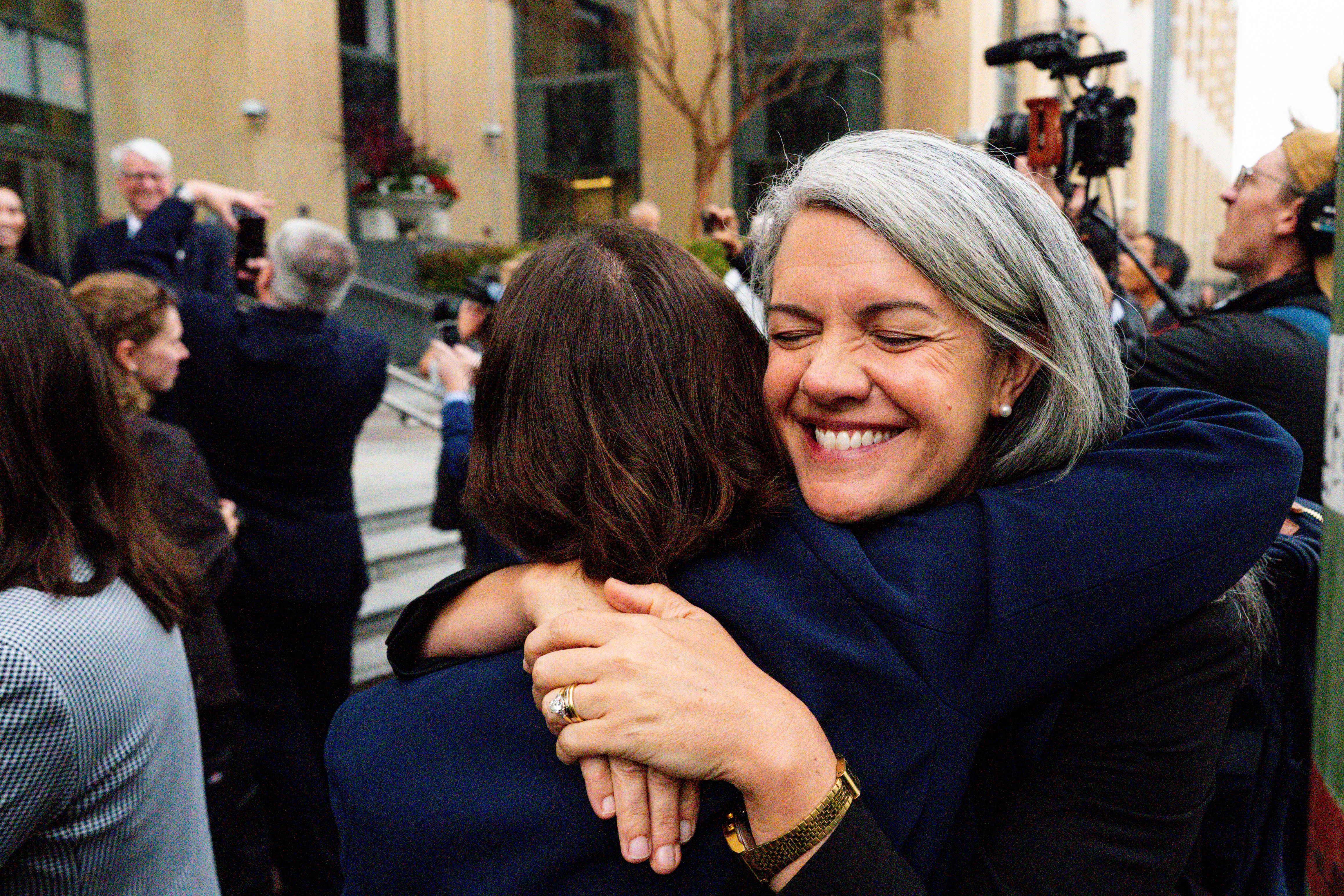 Colorado Solicitor General Shannon Stevenson hugs a colleague outside of court after tech giant Meta agreed to pay $17 billion as part of a settlement to end a landmark trial over teen social media addiction in Oakland, Wednesday. Despite the settlement, privacy concerns remain for future users.