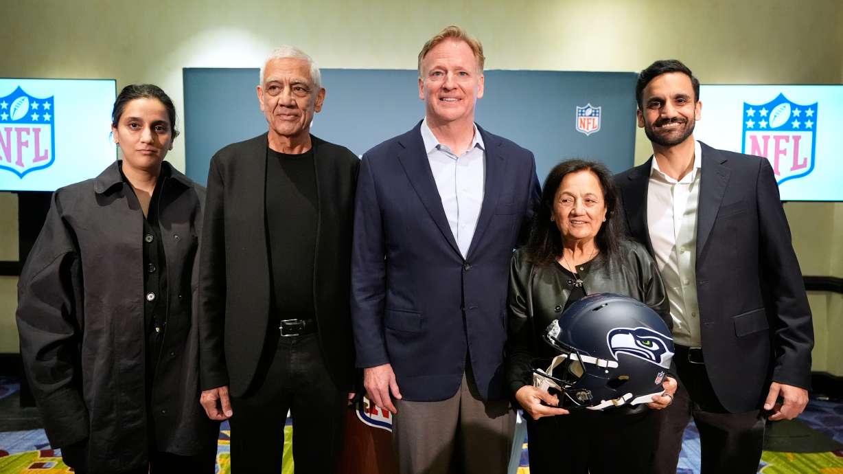 Seattle Seahawks owner's The Khosla family, and NFL commissioner Roger Goodell, Nina Khosla, left, Vinod Khosla, Neeru Khosla, and Neal Khosla pose for a portrait during a news conference at an NFL football owners meeting on Wednesday, Aug. 26, 2026, in Atlanta.
