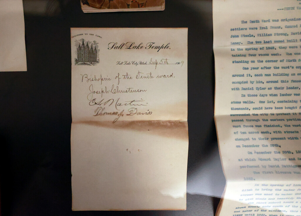 Contents of a 1909 time capsule, found in the cornerstone of a historic building of The Church of Jesus Christ of Latter-day Saints, are on display at the Tenth Ward Square in Salt Lake City on Tuesday.