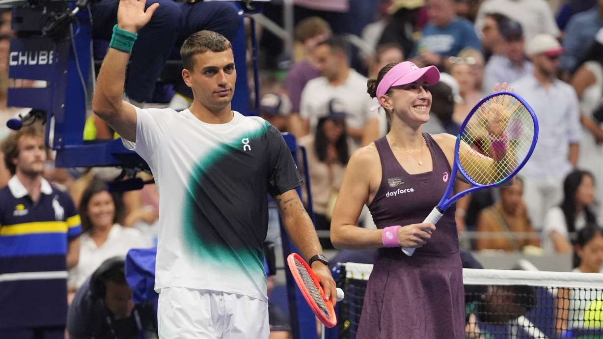 Belinda Bencic, of Switzerland, and Flavio Cobolli, of Italy, left, celebrate after defeating Elina Svitolina, of Ukraine, and Gael Monfils, of France, in a mixed doubles semifinal match at the U.S. Open tennis championships Wednesday, Aug. 26, 2026, in New York.