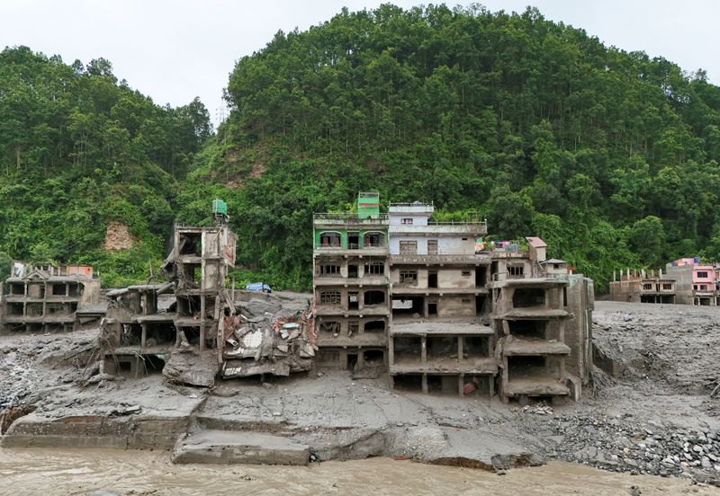 Hundreds killed, more than 1,000 missing in Nepal and China after Himalayan flood