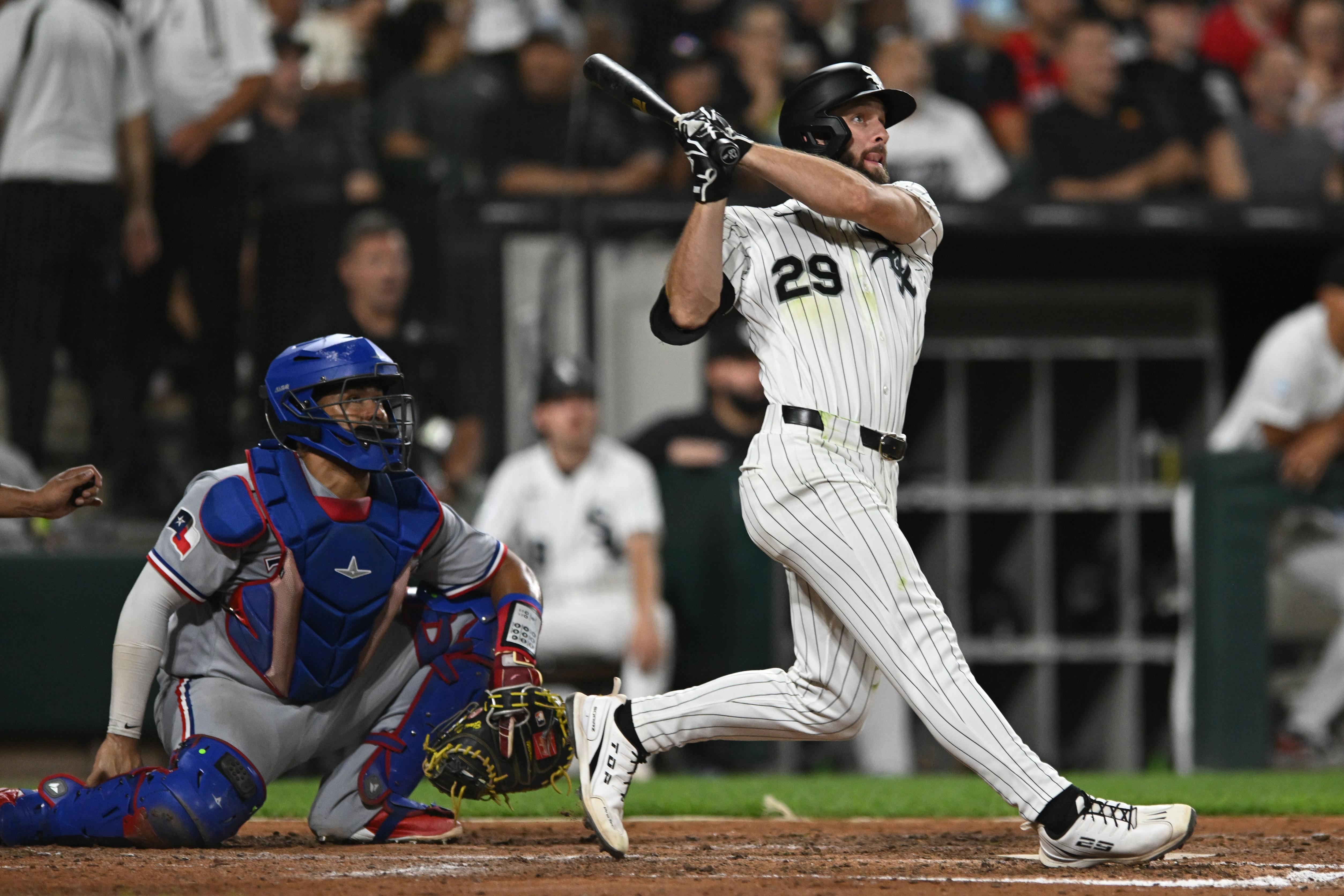 Chicago White Sox's Tristan Peters watches his two-run home during the fifth inning of a baseball game against the Texas Rangers in Chicago, Wednesday, Aug. 26, 2026. 