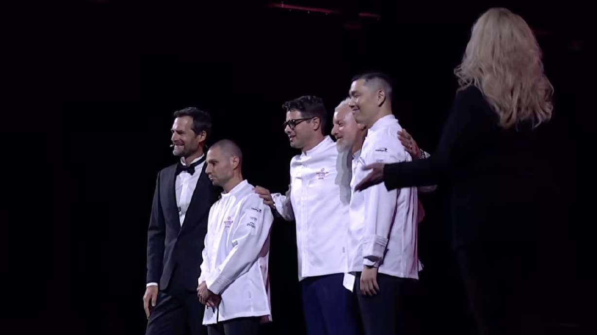 Martin Babio, chef of Monte, center, and other chefs celebrate after winning a coveted Michelin star during a ceremony in Las Vegas on Wednesday.