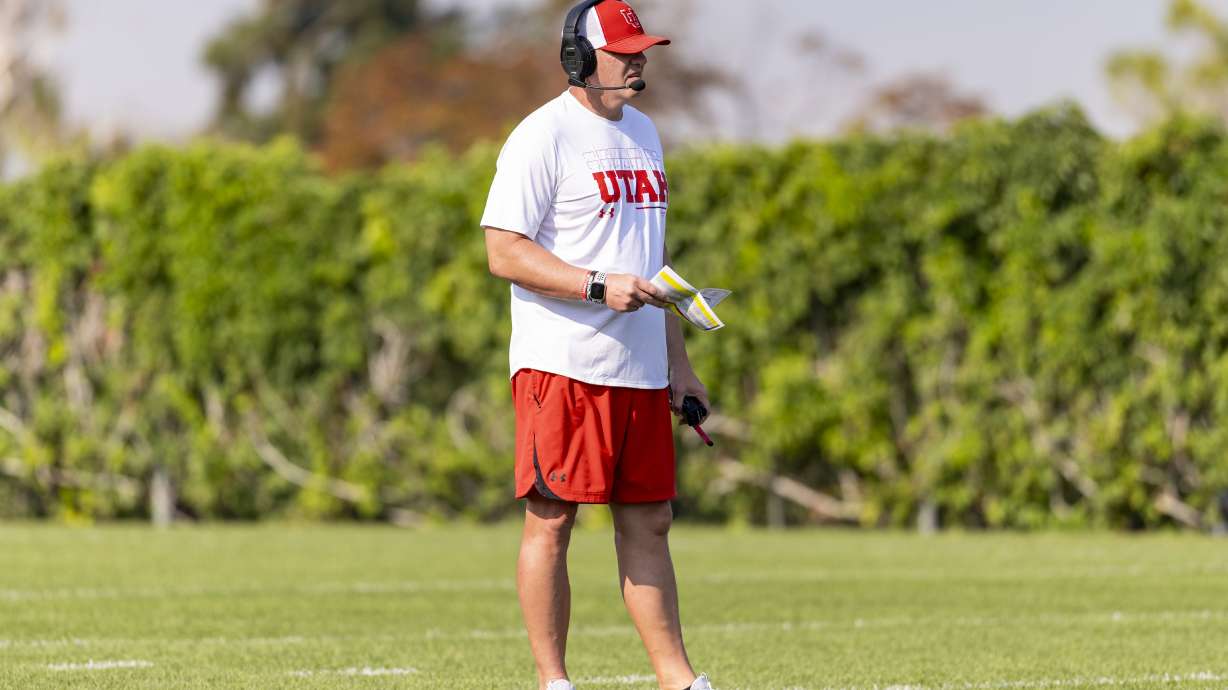 Utah offensive coordinator Kevin McGiven looks on during fall practice in Salt Lake City.