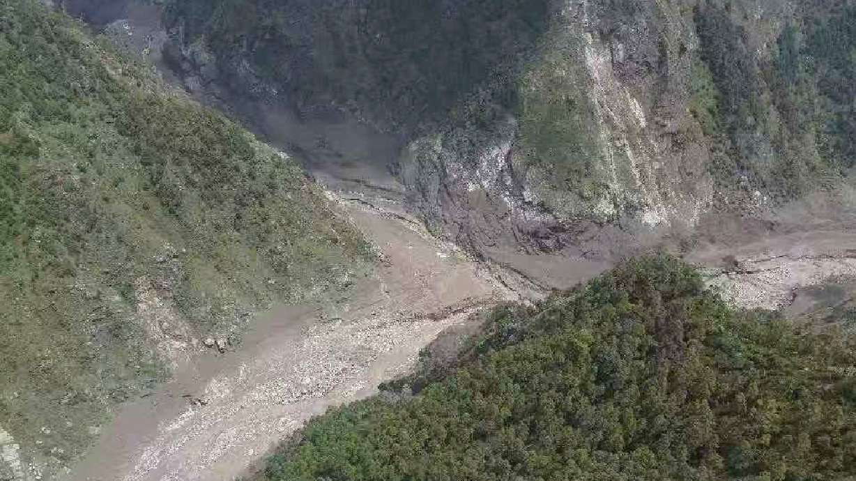 This photo released by Xinhua News Agency, shows a mudslide-hit area near Gyirong Port in southwestern China's Tibetan Autonomous Region on Wednesday, Aug. 26, 2026.