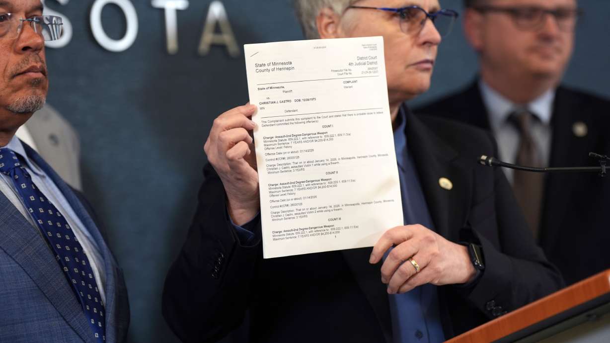 Hennepin County attorney Mary Moriarty holds up a document containing charges against ICE agent Christian Castro during a news conference at the Hennepin County Government Center in Minneapolis, on May 18.