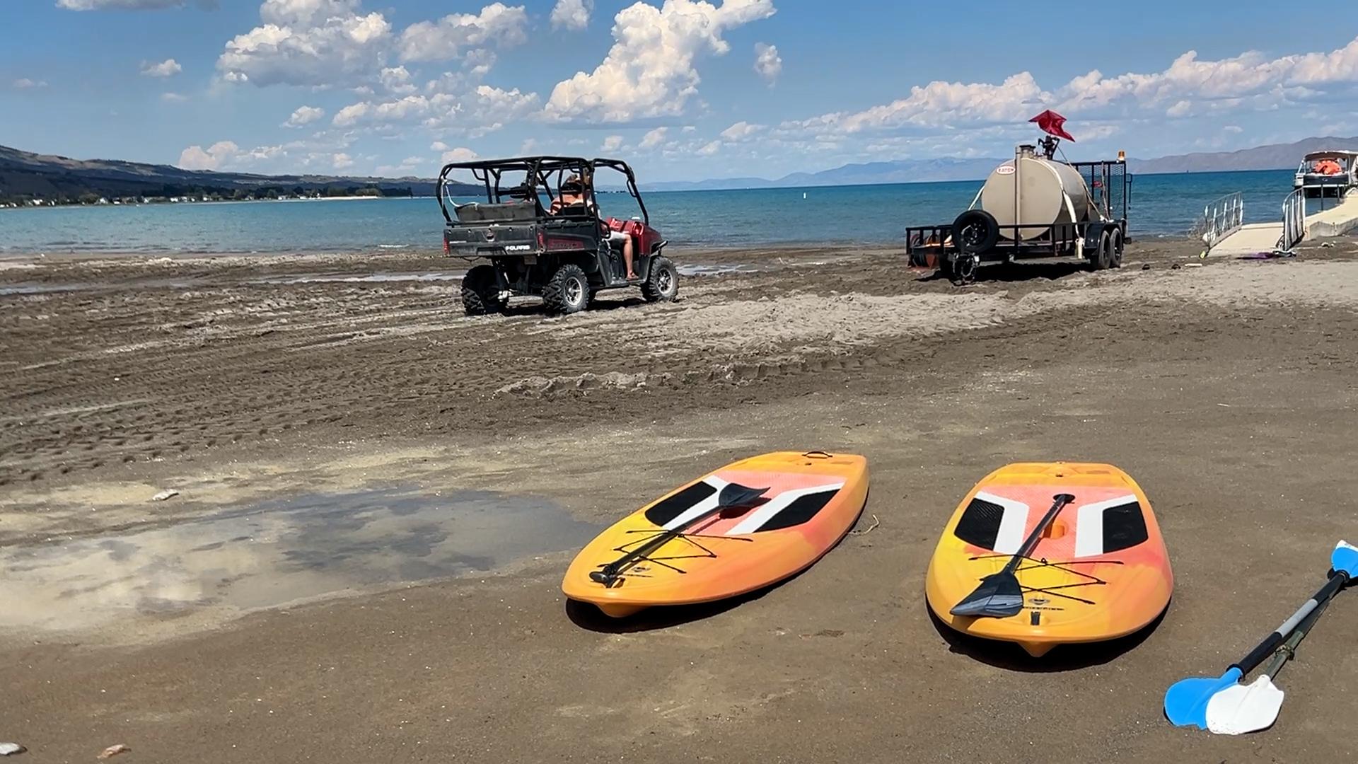 Bear Lake Rentals employees manage rental equipment at Rendezvous Beach at Bear Lake State Park as crowds die down at summer's end.