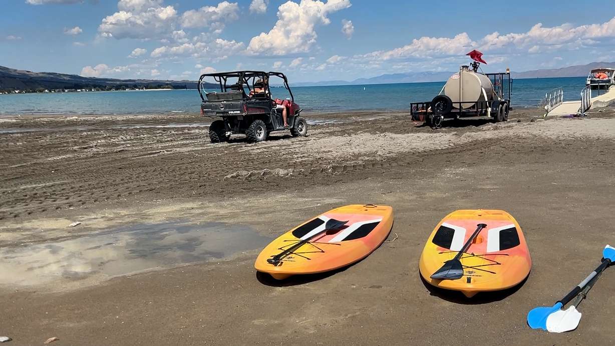 Bear Lake Rentals employees manage rental equipment at Rendezvous Beach at Bear Lake State Park as crowds die down at summer's end.