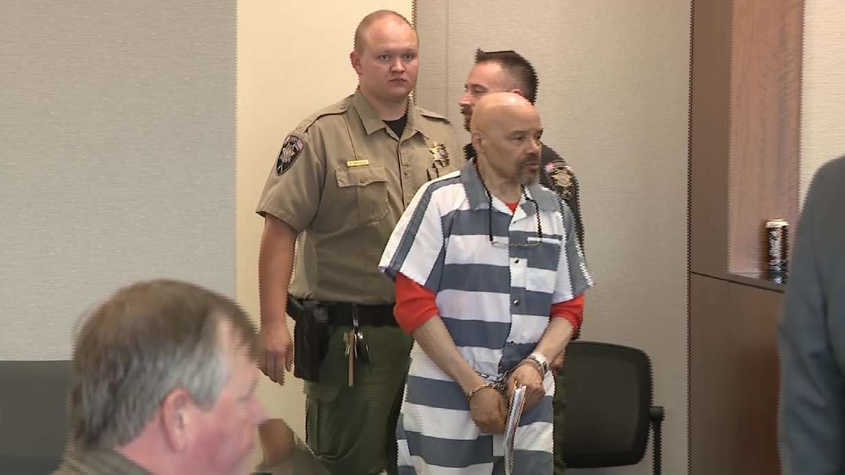 Douglas Carter enters a courtroom on Wednesday to attend a hearing in which his defense argued for his release on bail while he awaits a new trial.