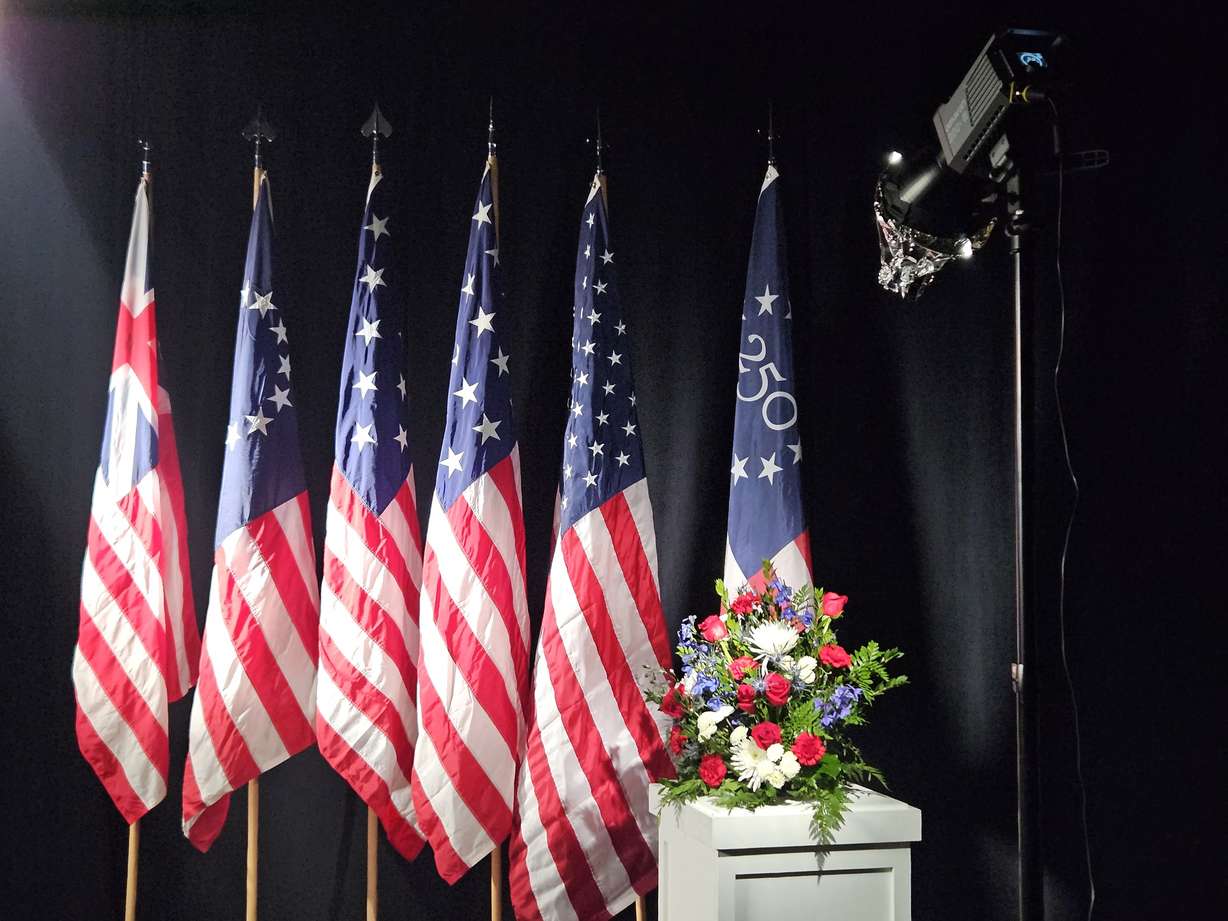 DeVaughn Simper's collection of historic American flags against a dark backdrop as seen in July of 2025.