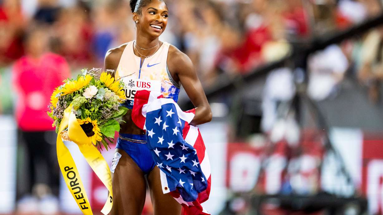 United States' Masai Russell celebrates after winning the women's 100-meter hurdles race, setting a new world record, at the Diamond League athletics meeting, Thursday, Aug. 27, 2026, in Zurich, Switzerland.