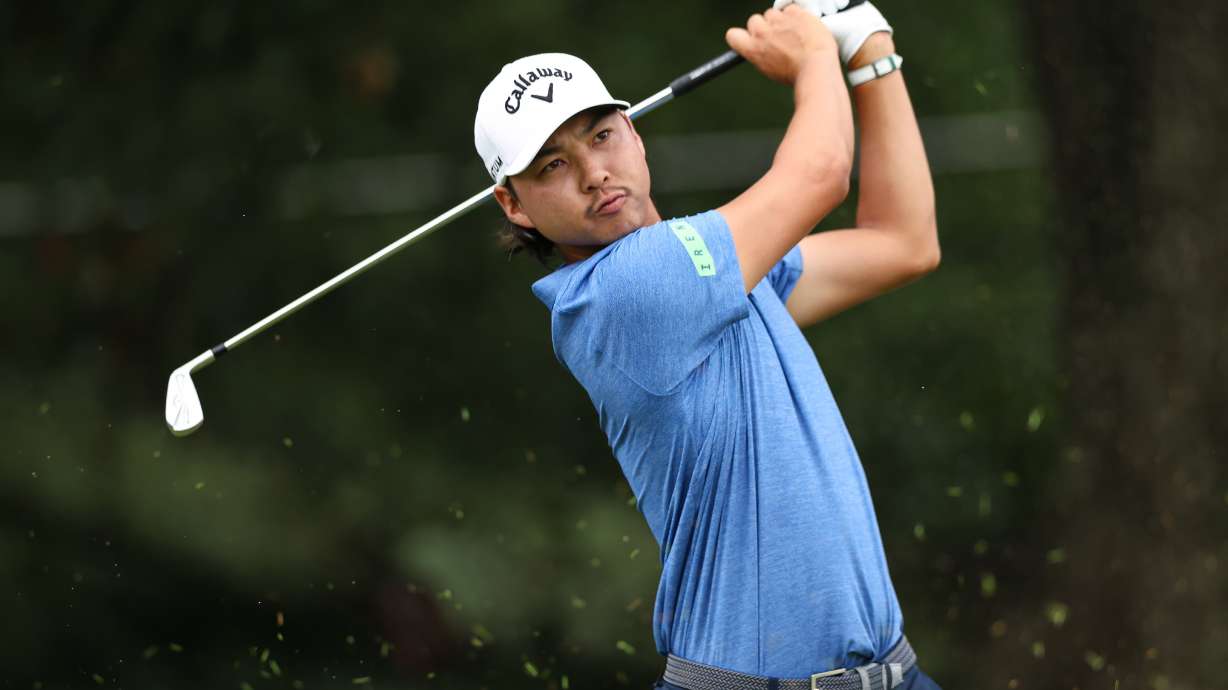 Min Woo Lee plays his tee shot on the third hole during the first round of the Tour Championship golf tournament, Thursday, Aug. 27, 2026, in Atlanta. CORRECTION: "Min Woo Lee" is correct not Si Woo Kim"