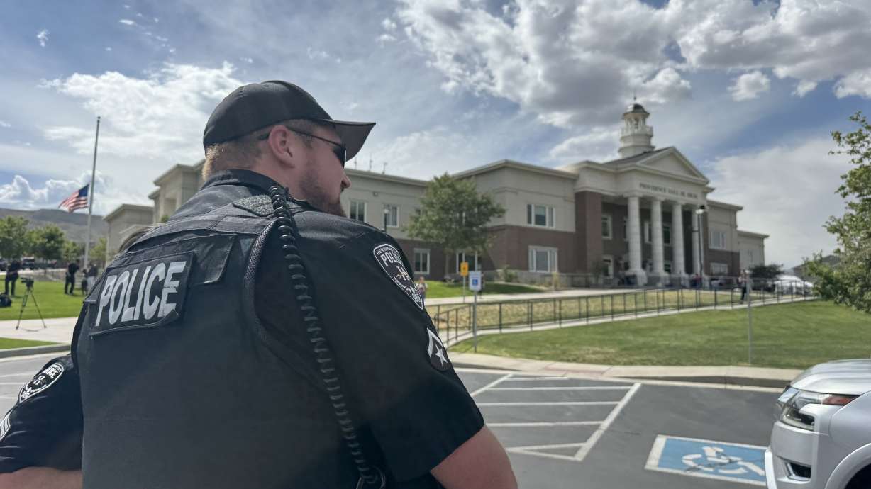 Police outside Providence Hall Junior High School in Herriman on Thursday. Police joined administrators at Providence Hall Junior High School Thursday to share an important reminder with students and parents about Utah's new e-bike law.