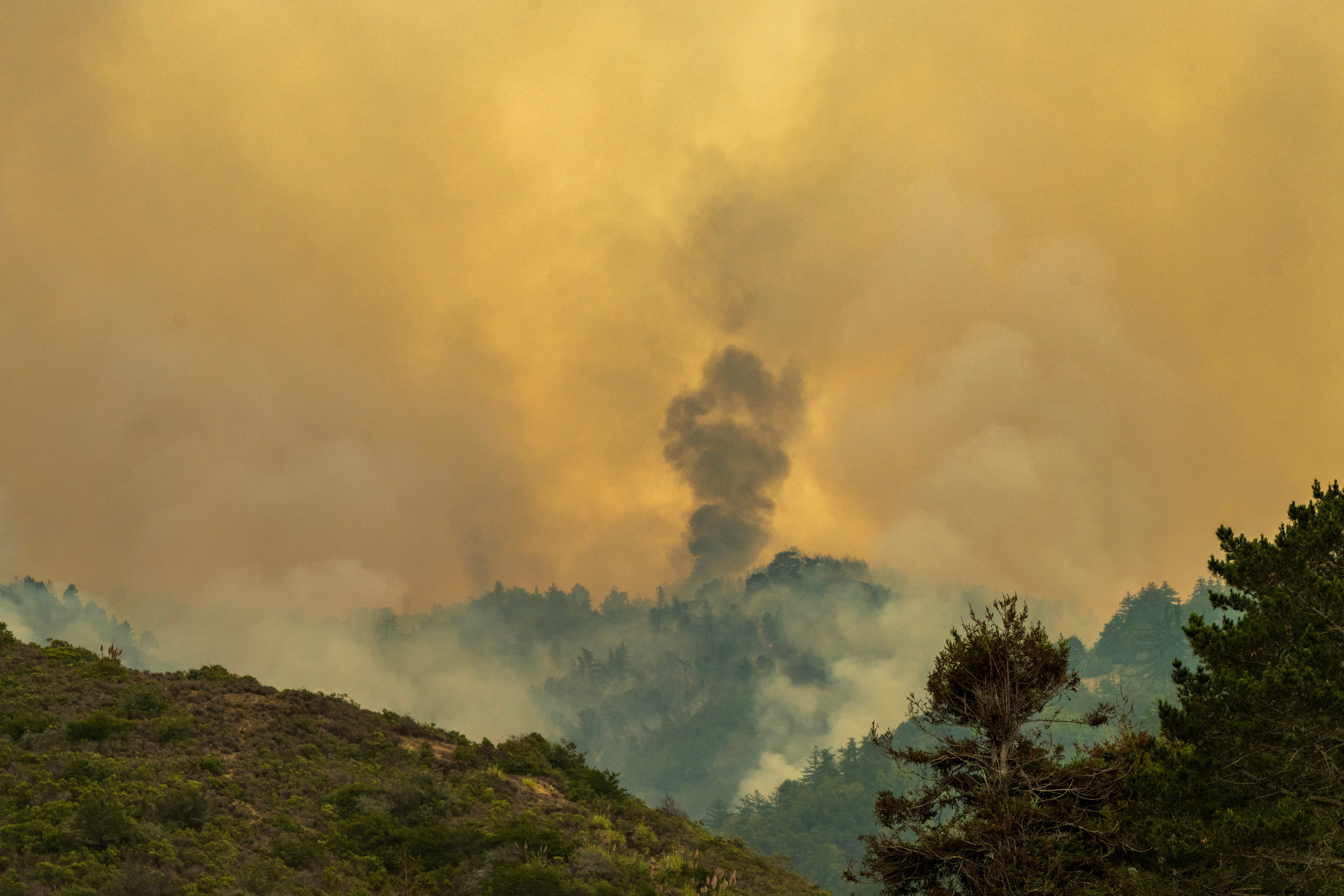 Smoke billows from the Plaskett Fire near Big Sur, Calif, Thursday, Aug. 27, 2026. 