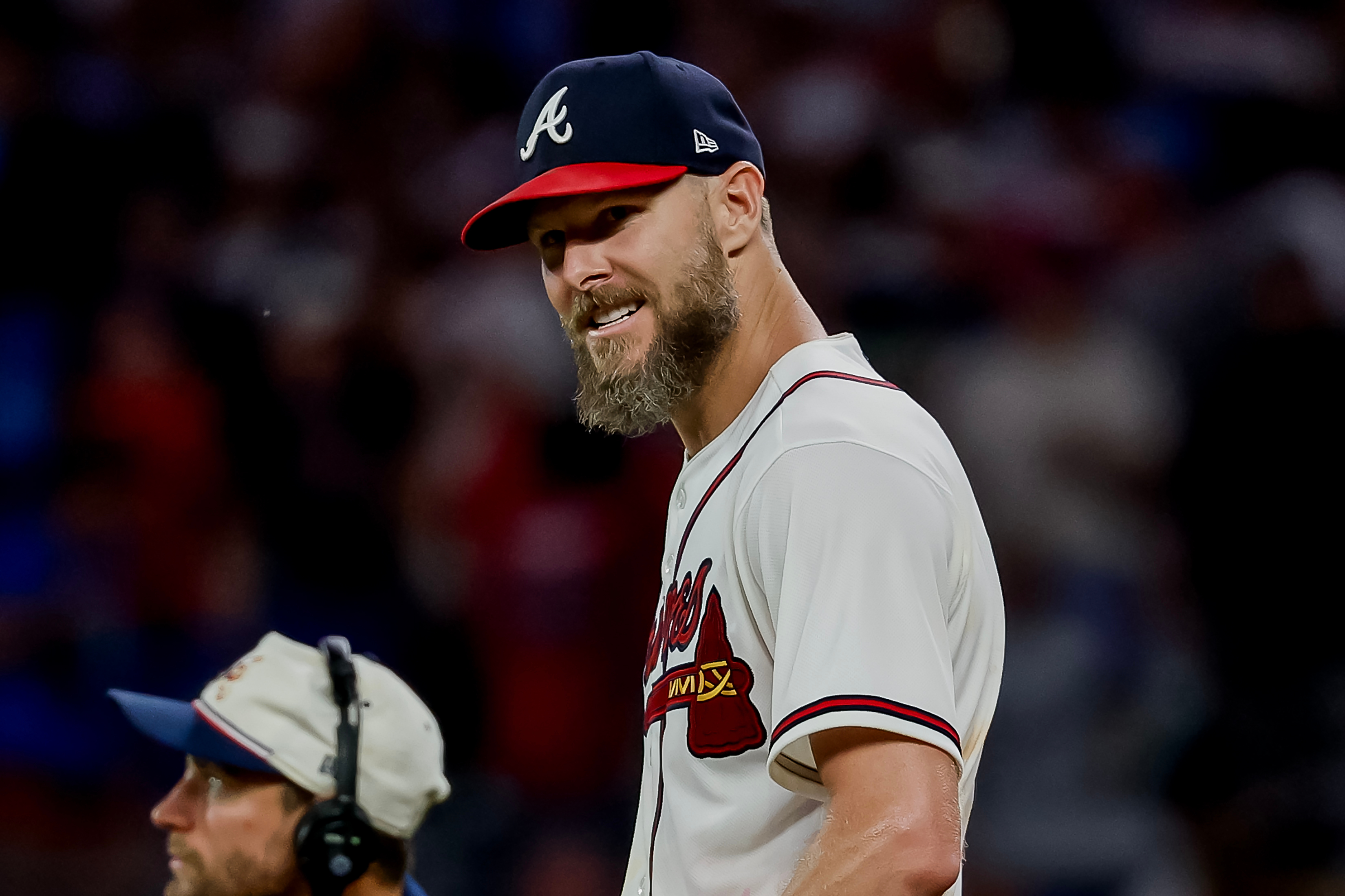 Atlanta Braves pitcher Chris Sale, right, celebrates after winning a baseball game shutout against the Los Angeles Dodgers, Thursday, Aug. 27, 2026, in Atlanta. 
