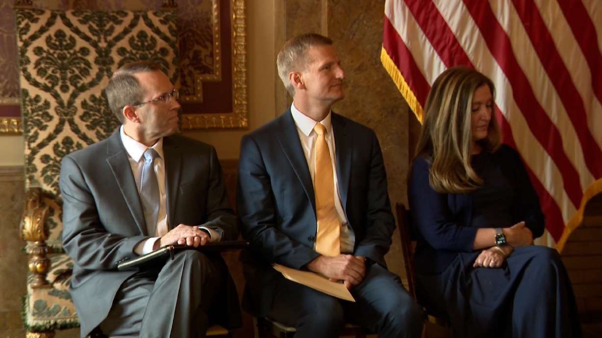Judge Matthew Bell, attorney Michael Menssen and Associate Chief Justice Jill Pohlman in the Gold Room at the Capitol in Salt Lake City as Gov. Spencer Cox announced appointments to fill two seats on the state Supreme Court Friday.