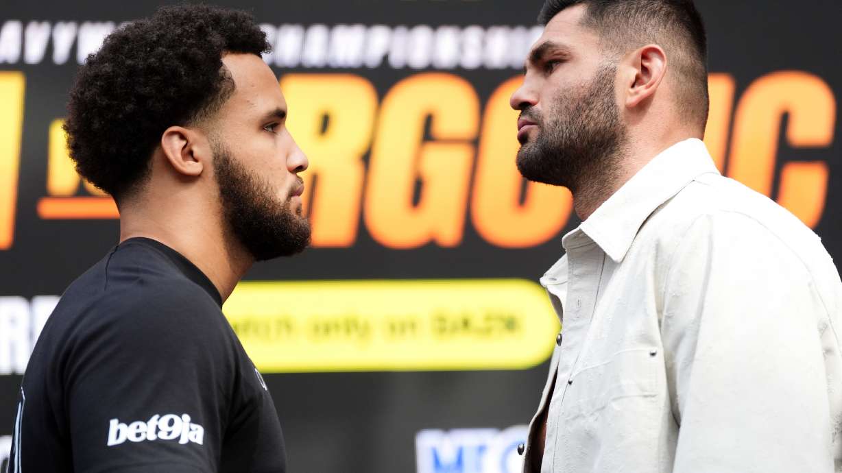 Boxers Filip Hrgovic, right, and Moses Itauma pose following a press conference, Thursday Aug. 27, 2026, in London, ahead of the IBF heavyweight championship bout.