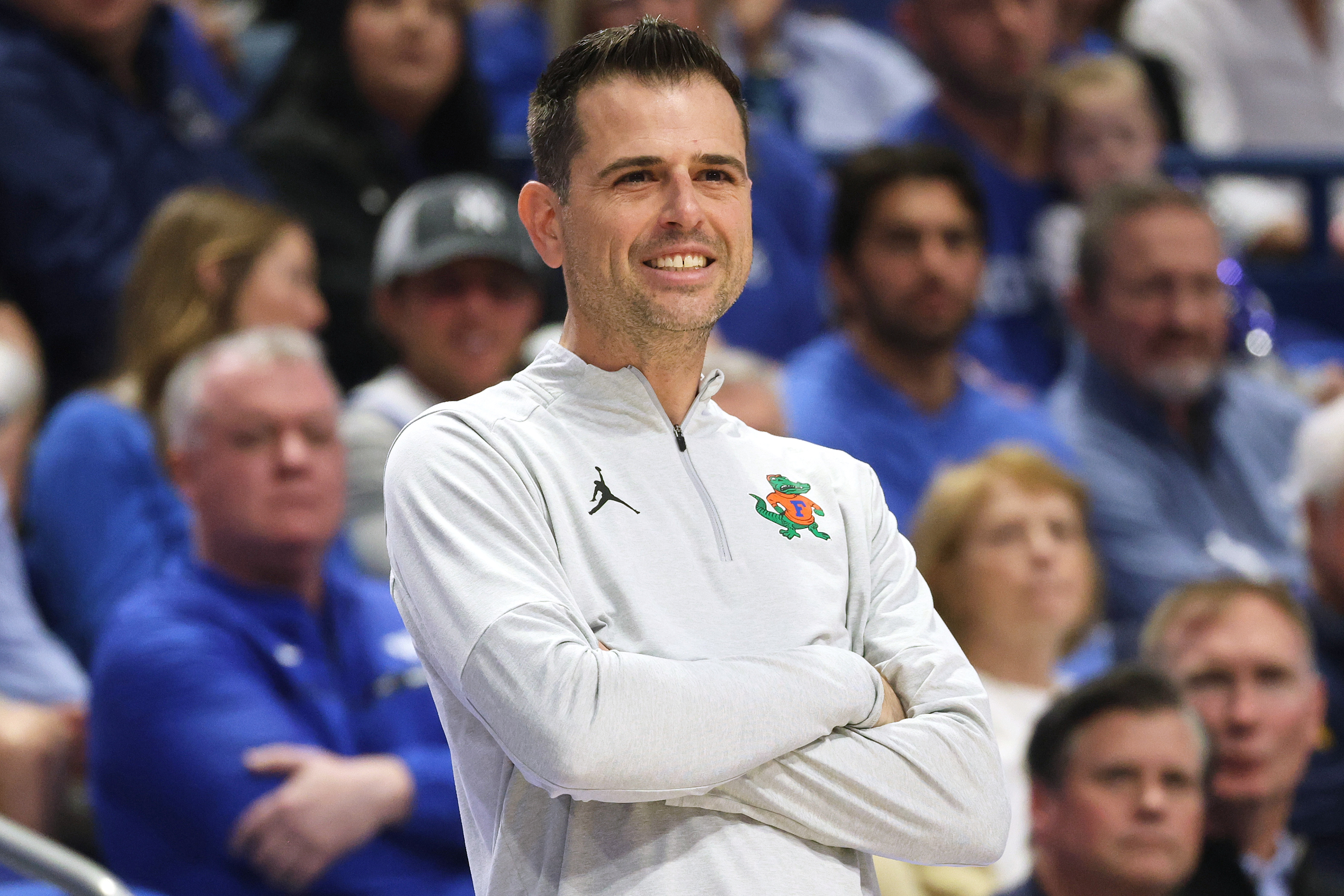 FILE - Florida head coach Todd Golden smiles during the second half of an NCAA college basketball game against Kentucky in Lexington, Ky., March 7, 2026. 