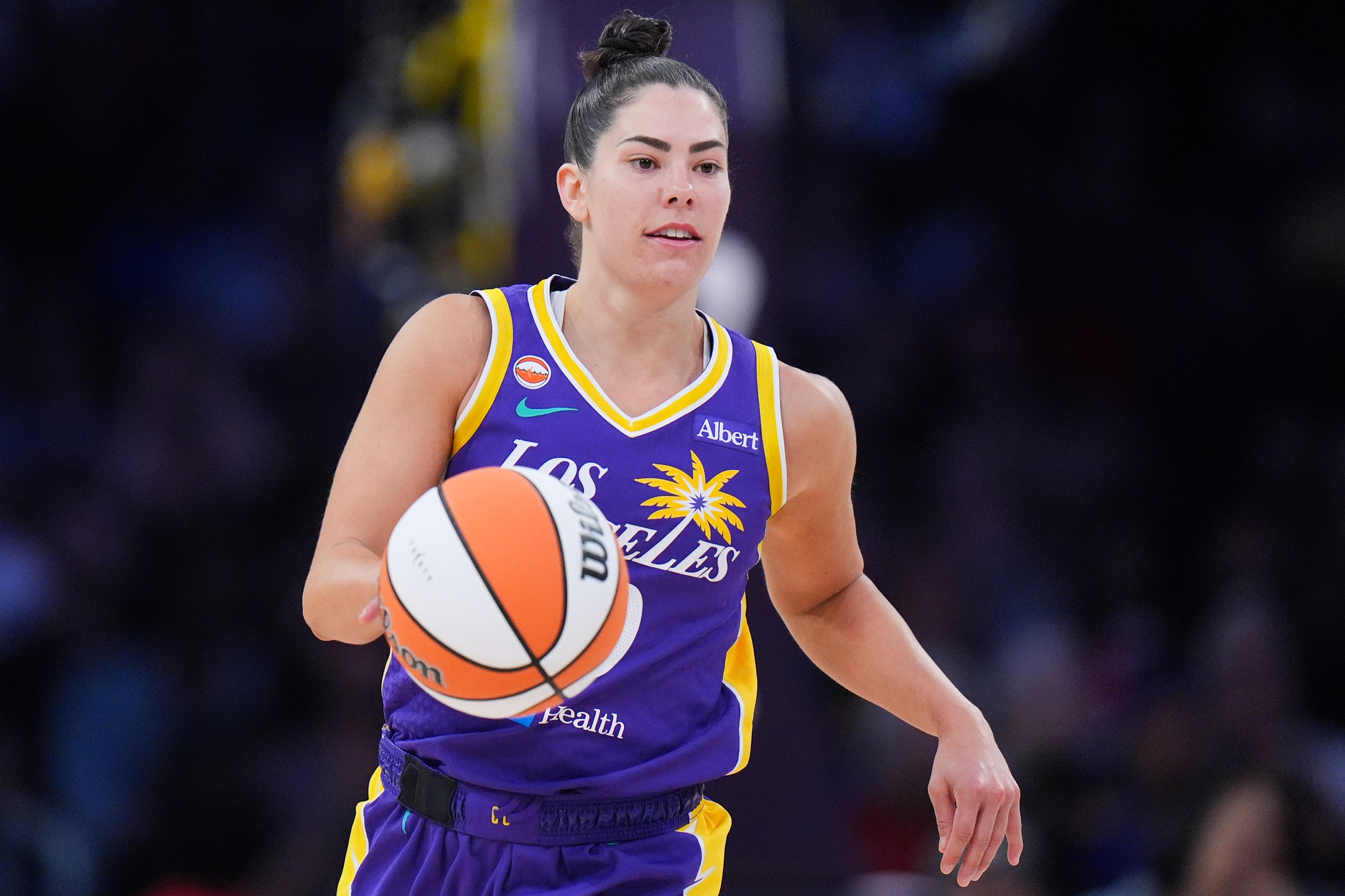 FILE - Los Angeles Sparks guard Kelsey Plum dribbles during the second half of a WNBA basketball game against the Indiana Fever, May 13, 2026, in Los Angeles. 