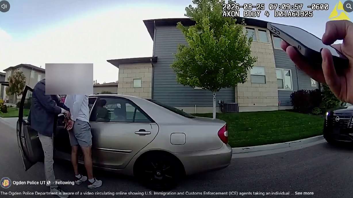 An Ogden official seeks clearer guidelines for police when working with ICE agents after an Aug. 25 incident involving an immigrant. The photo from an Ogden officer's body camera shows an ICE agent arresting the immigrant and the officer's hand.
