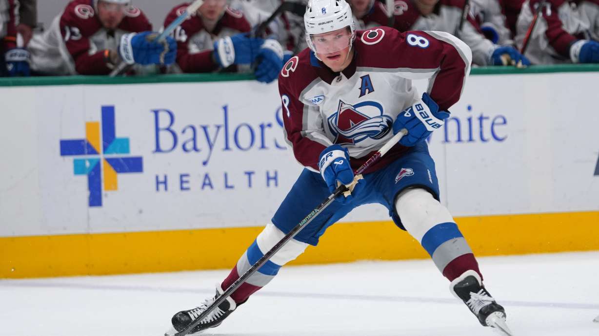 FILE - Colorado Avalanche defenseman Cale Makar skates with the puck during the second period of an NHL hockey game against the Dallas Stars, March 6, 2026, in Dallas.