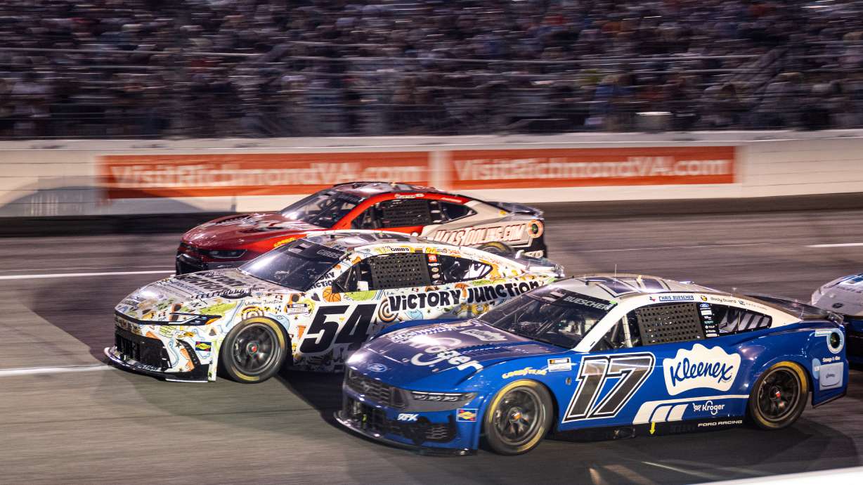 Roush Fenway Keselowski Racing driver Chris Buescher (17) and Joe Gibbs Racing driver Ty Gibbs (54) battle in turn one during Cook Out 400 at Richmond Raceway, Saturday, Aug. 15, 2026, in Richmond Va.
