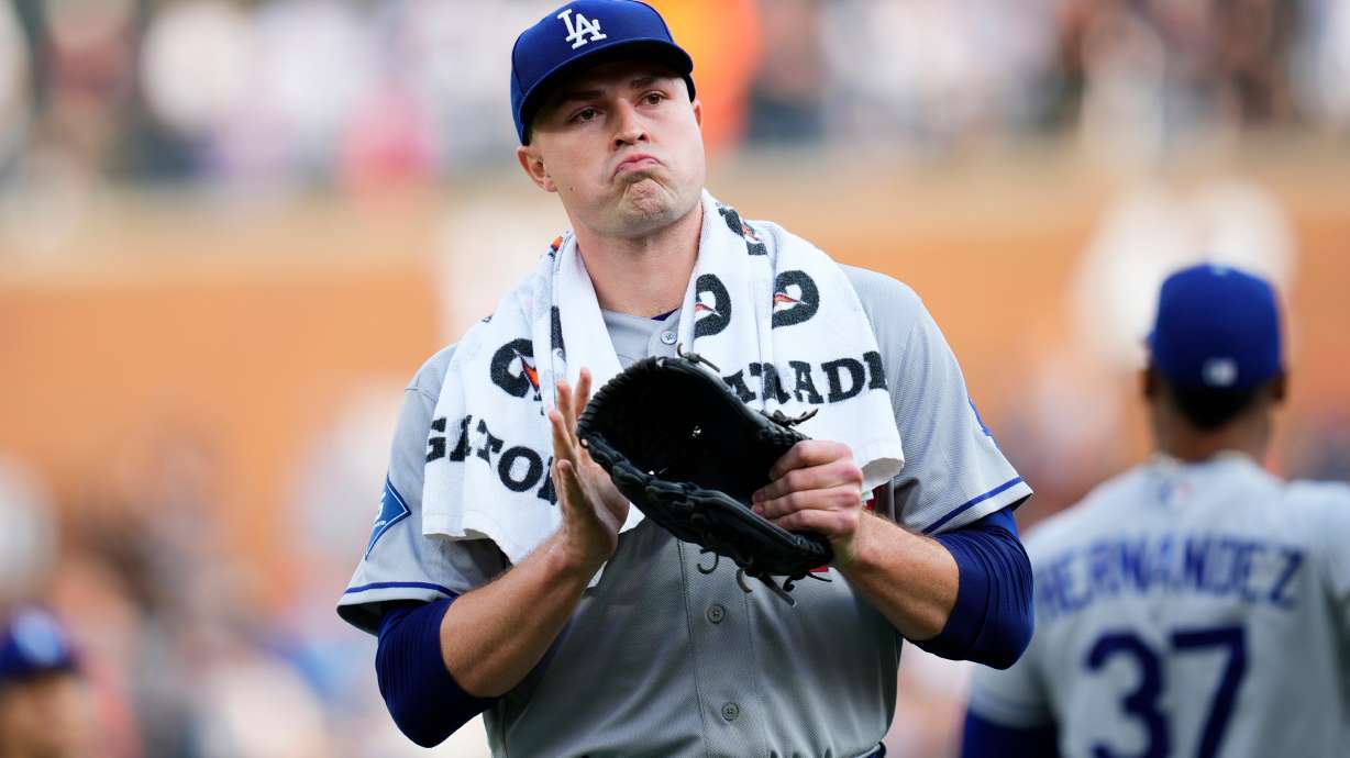 Los Angeles Dodgers pitcher Tarik Skubal claps as he walks to the dugout before the first inning of a baseball game against the Detroit Tigers Friday, Aug. 28, 2026, in Detroit.