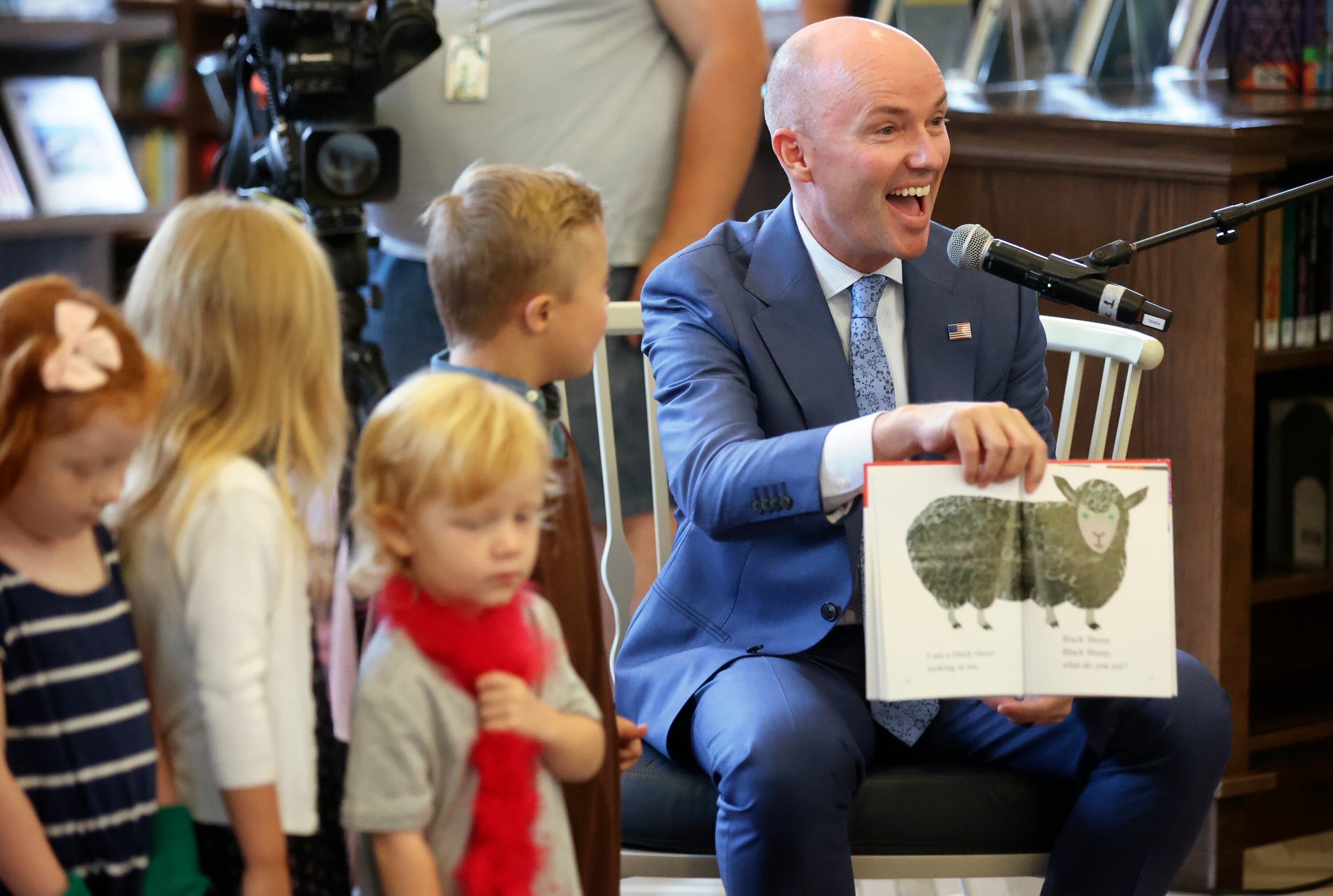 Gov. Spencer Cox reads “Brown Bear, Brown Bear, What Do You See?” at the launch of Utah Reads, a statewide early literacy initiative, at the Sprague branch of the Salt Lake City Public Library in Salt Lake City on Aug. 28.