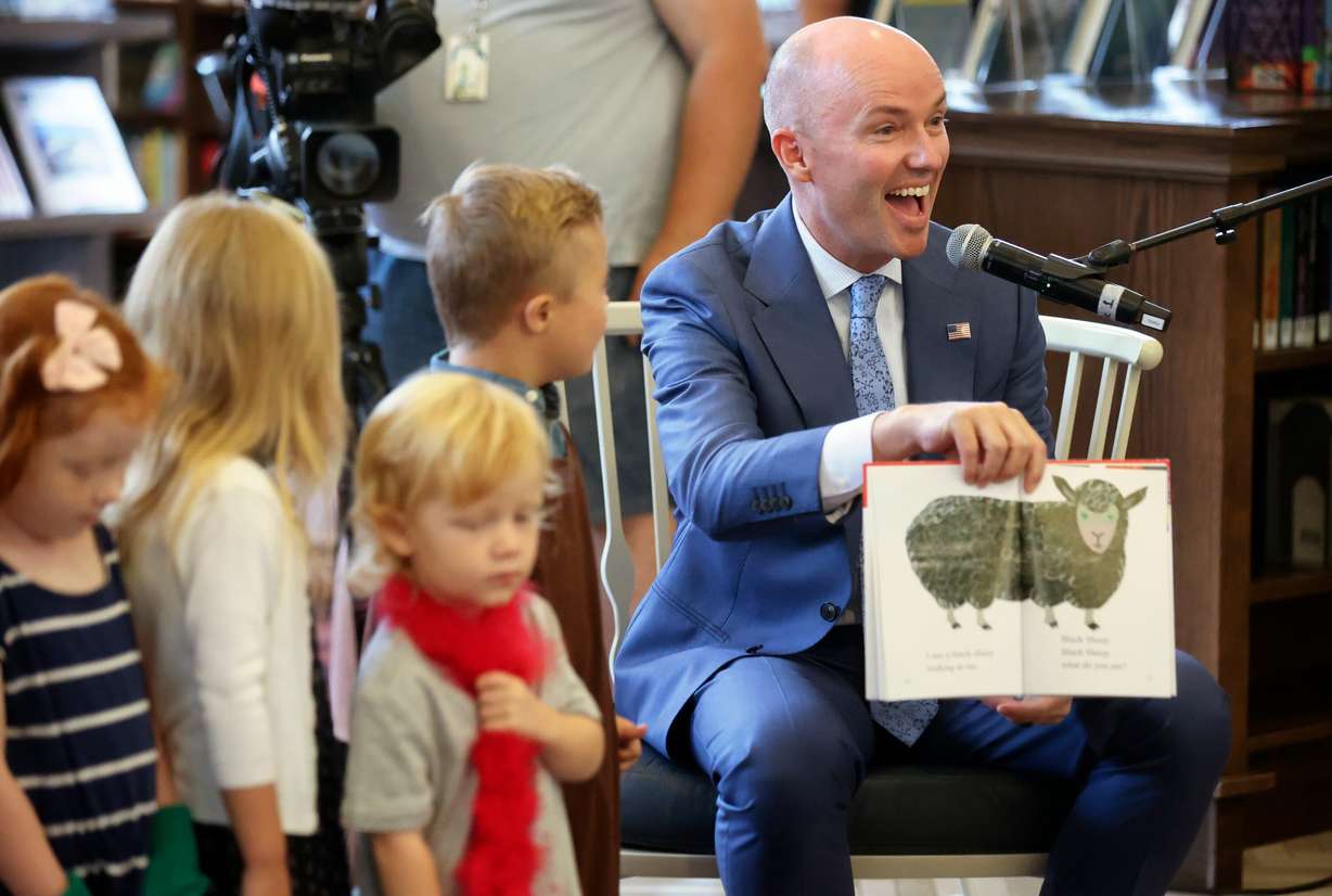 Gov. Spencer Cox reads “Brown Bear, Brown Bear, What Do You See?” at the launch of Utah Reads, a statewide early literacy initiative, at the Sprague branch of the Salt Lake City Public Library in Salt Lake City on Aug. 28.
