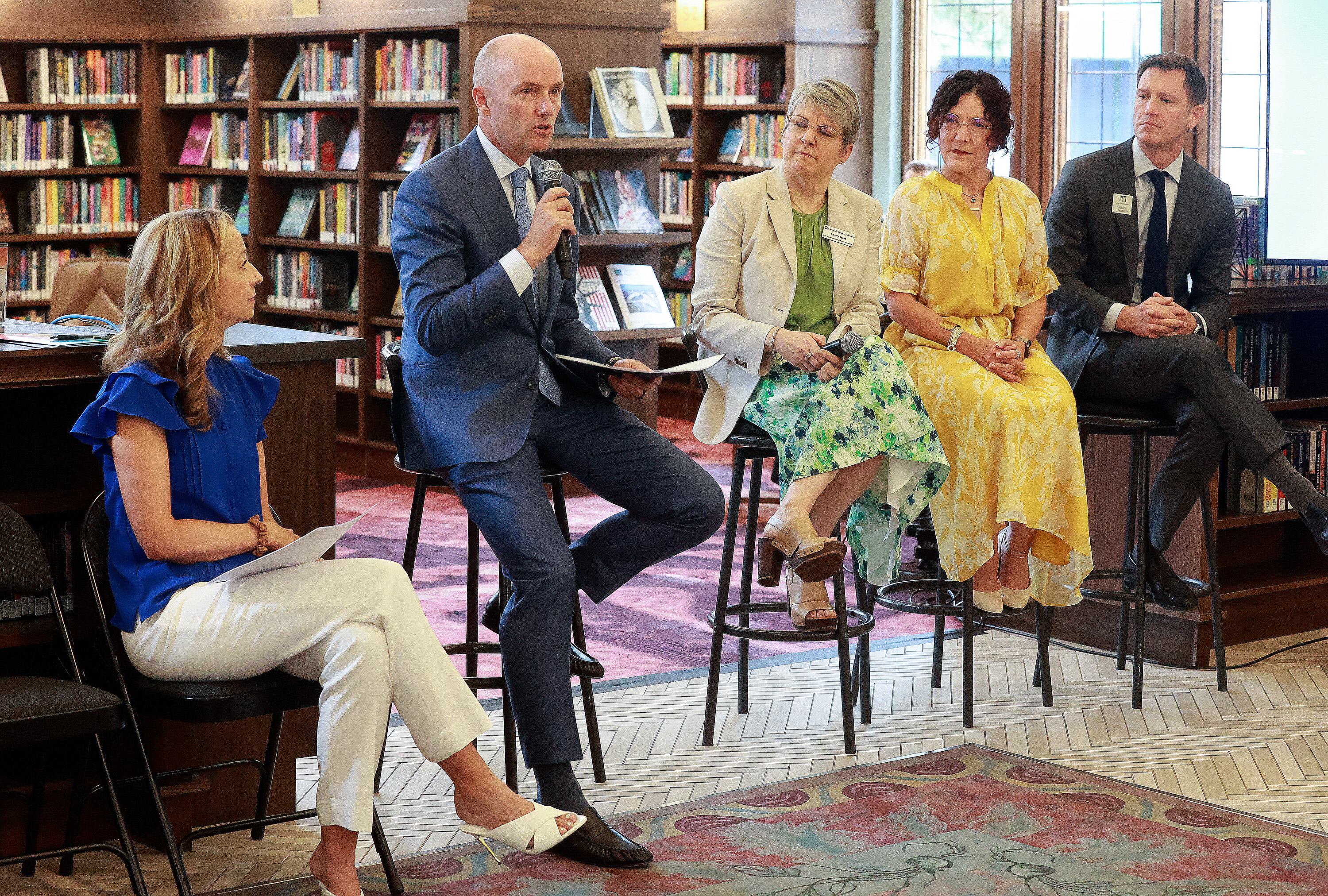 Gov. Spencer Cox moderates a panel on early literacy during the launch of Utah Reads, a statewide early literacy initiative, at the Sprague branch of the Salt Lake City Public Library in Salt Lake City on Aug. 28. First lady Abby Cox is on the left. Molly Hart, Utah State Board of Education superintendent of public instruction, and Rebecca Dutson, The Children's Center president and CEO, and Noah Baskett, Salt Lake City Public Library executive director, are on the right.