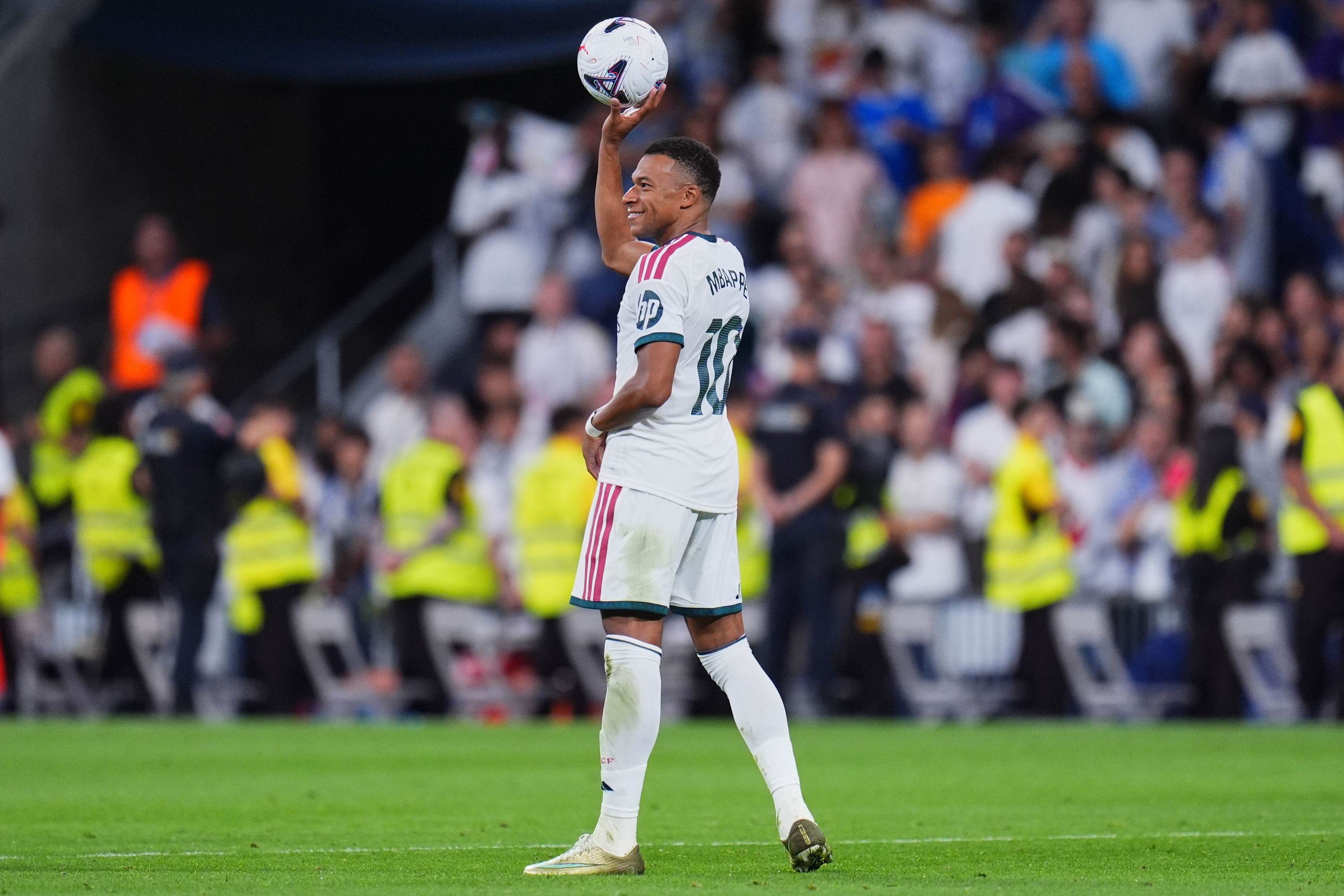 Real Madrid's Kylian Mbappe celebrates after scoring during the La Liga soccer match between Real Madrid and Real Sociedad in Madrid, Spain, Wednesday, Aug. 26, 2026. 