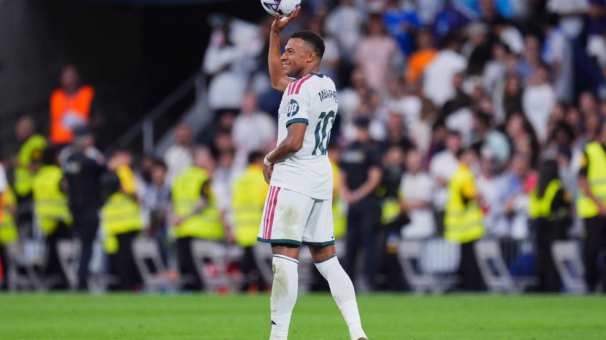 Real Madrid's Kylian Mbappe celebrates after scoring during the La Liga soccer match between Real Madrid and Real Sociedad in Madrid, Spain, Wednesday, Aug. 26, 2026.