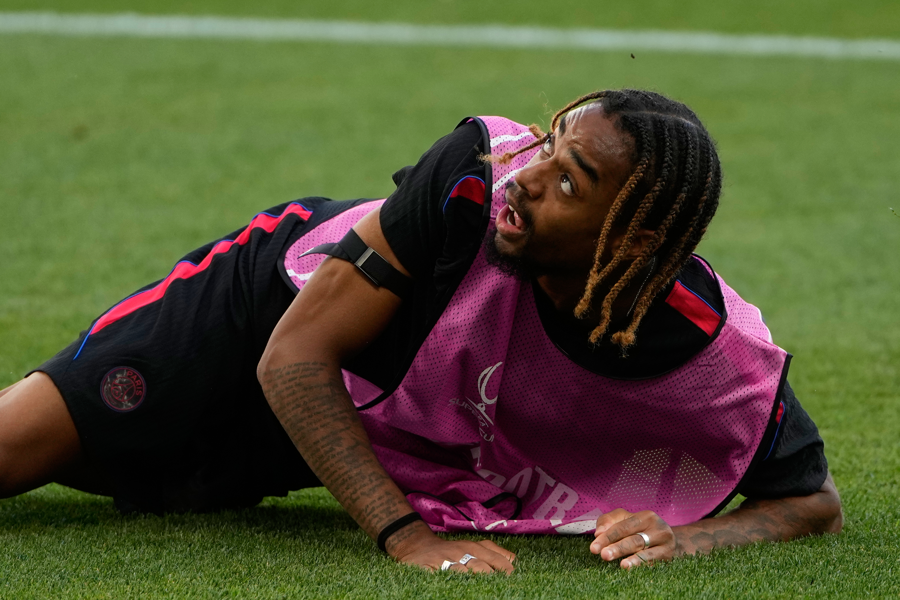 PSG's Bradley Barcola eyes the ball during a training session ahead of the UEFA Super Cup soccer match against Aston Villa in Salzburg, Austria, Tuesday, Aug. 11, 2026. 