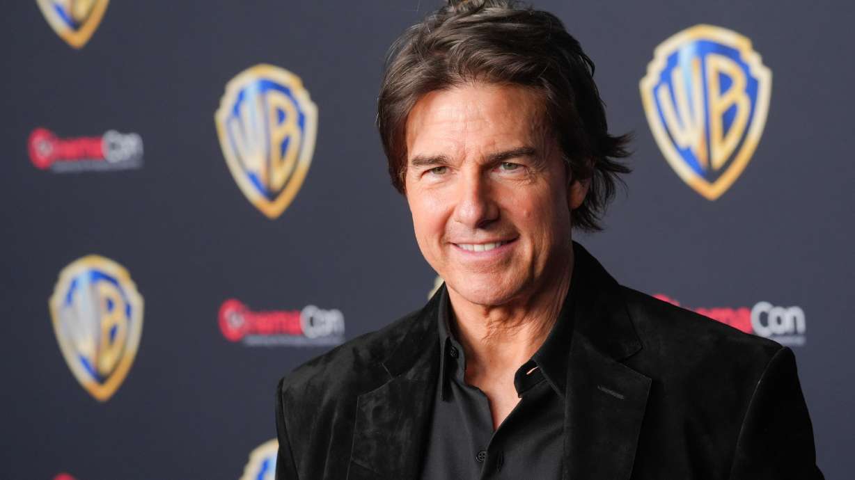 FILE - Tom Cruise arrives at the Warner Bros. presentation at CinemaCon on April 14, 2026, at Caesars Palace in Las Vegas.