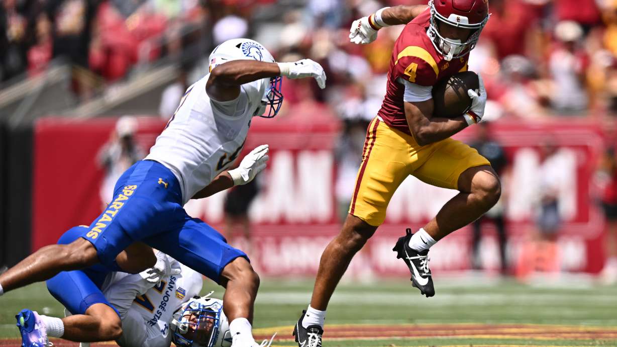 Southern California wide receiver Trent Mosley (4) runs with the ball during the first half of an NCAA college football game against San Jose State, Saturday, Aug. 29, 2026, in Los Angeles.