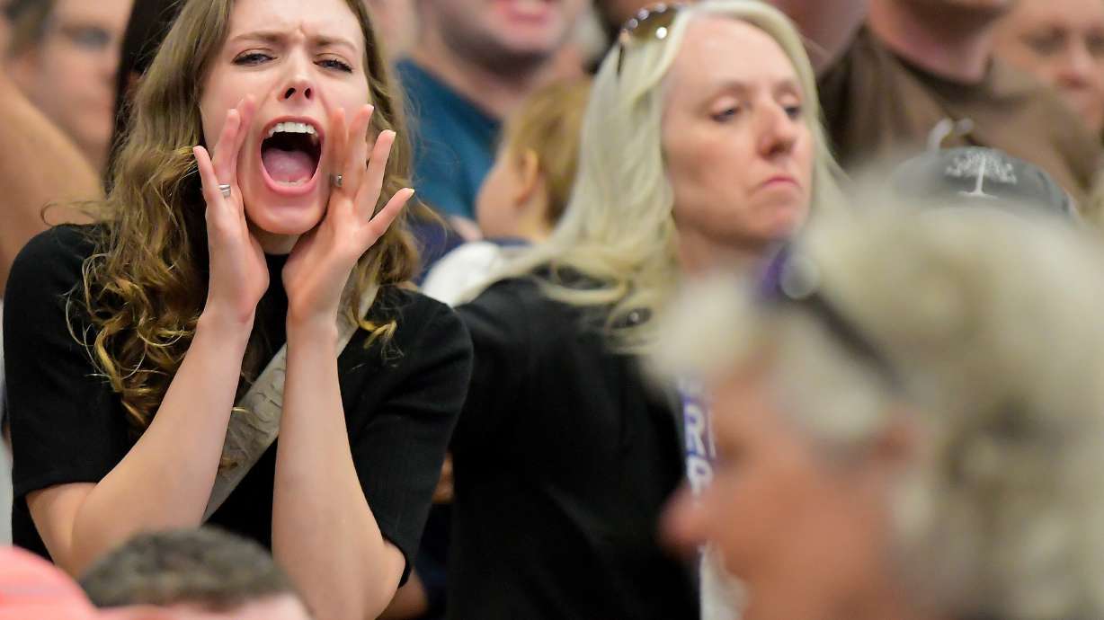 A person yells at members of the Box Elder County commissioners during a meeting where a data center was discussed on May 4, in Tremonton. Elon Musk's social media company, X, identified hundreds of suspected Chinese accounts amplifying arguments against artificial intelligence data centers, X Global Government Affairs announced