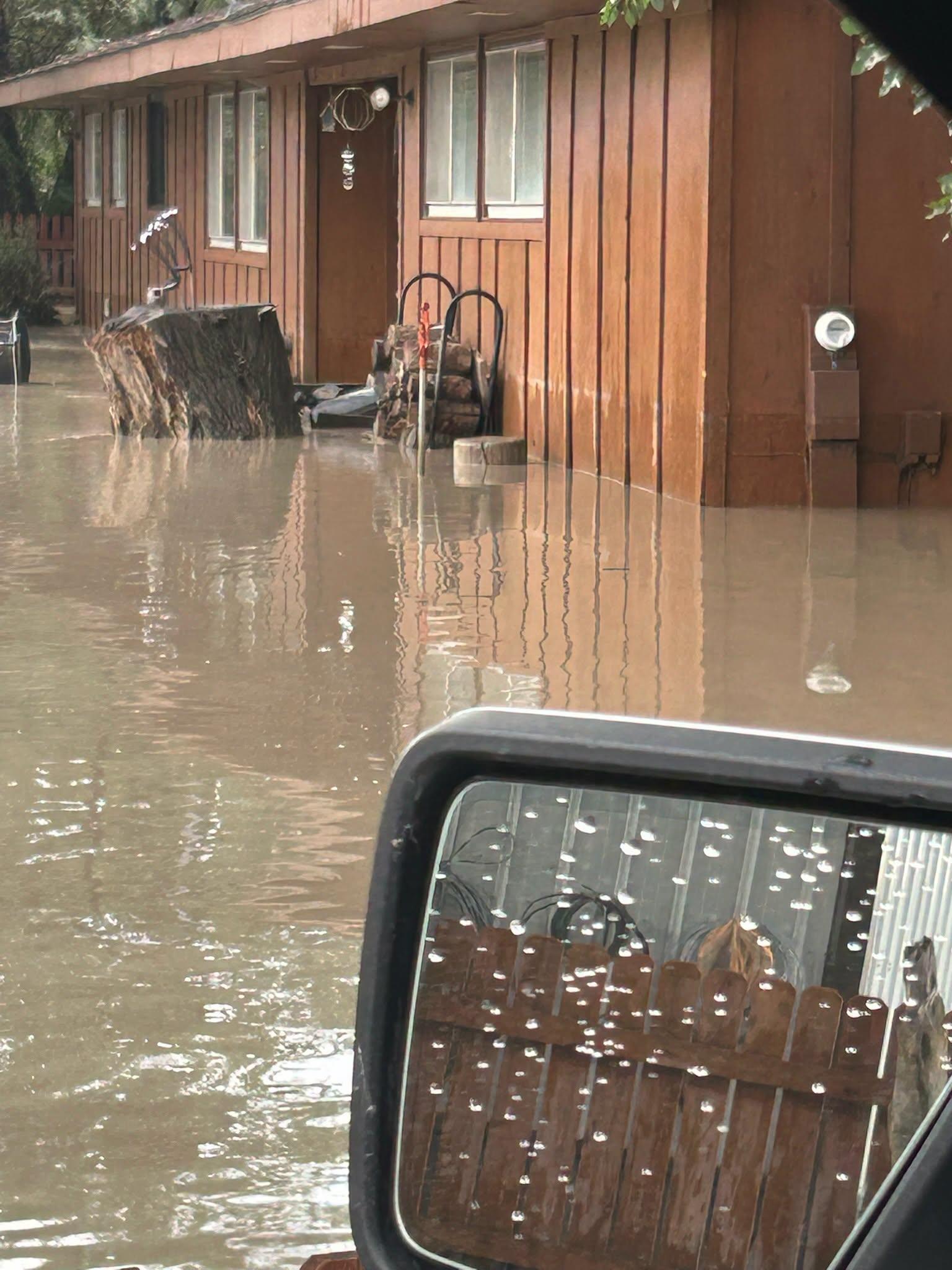Multiple homes and roadways were flooded in Emery County on Saturday, following heavy rains.