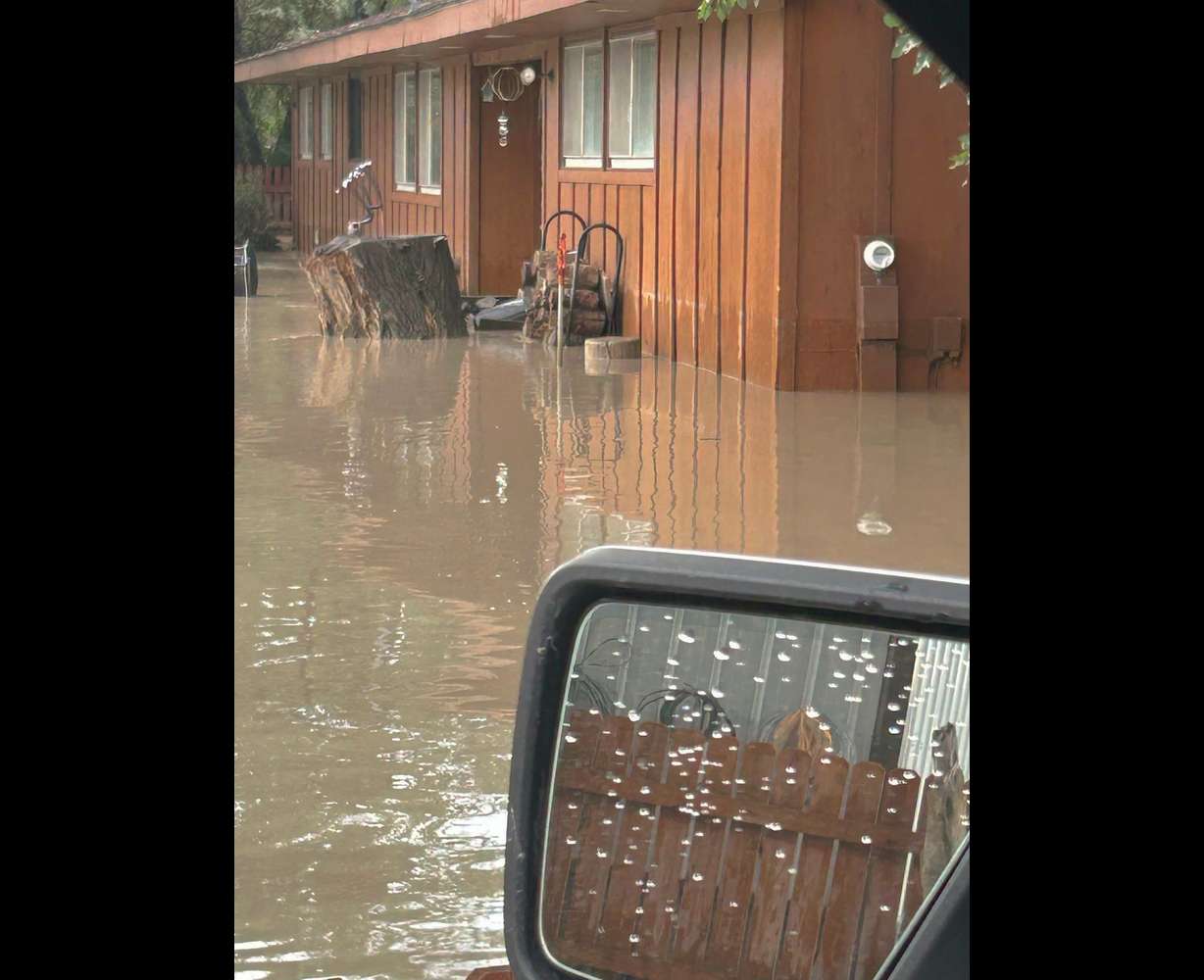 Multiple homes and roadways were flooded in Emery County on Saturday, following heavy rains.