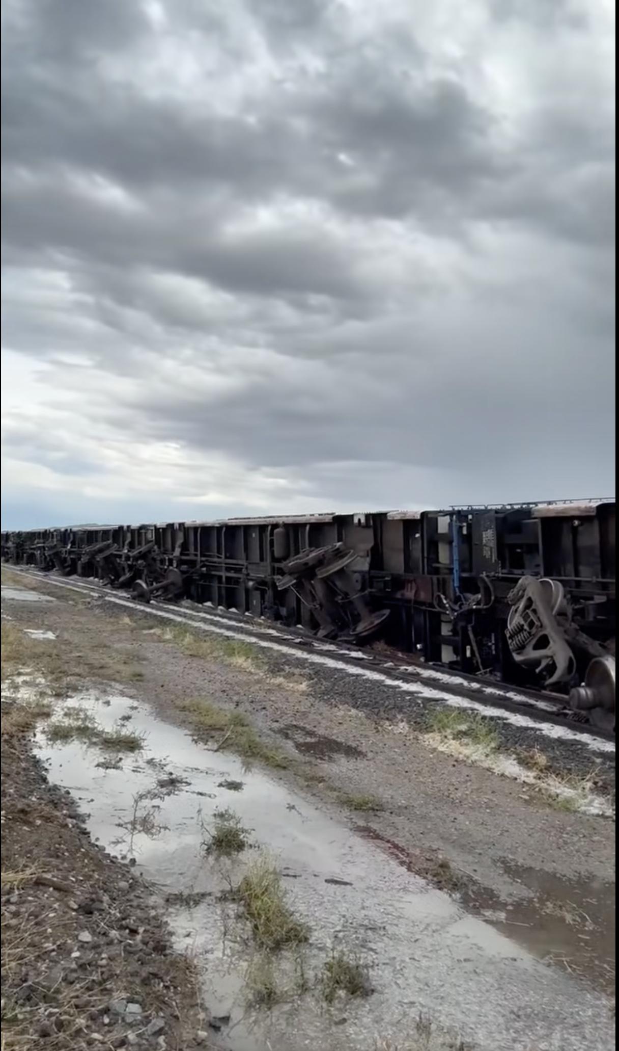 Following strong winds during a storm in Millard County, 34 train cars flipped over off the tracks outside Lynndyl on Saturday.