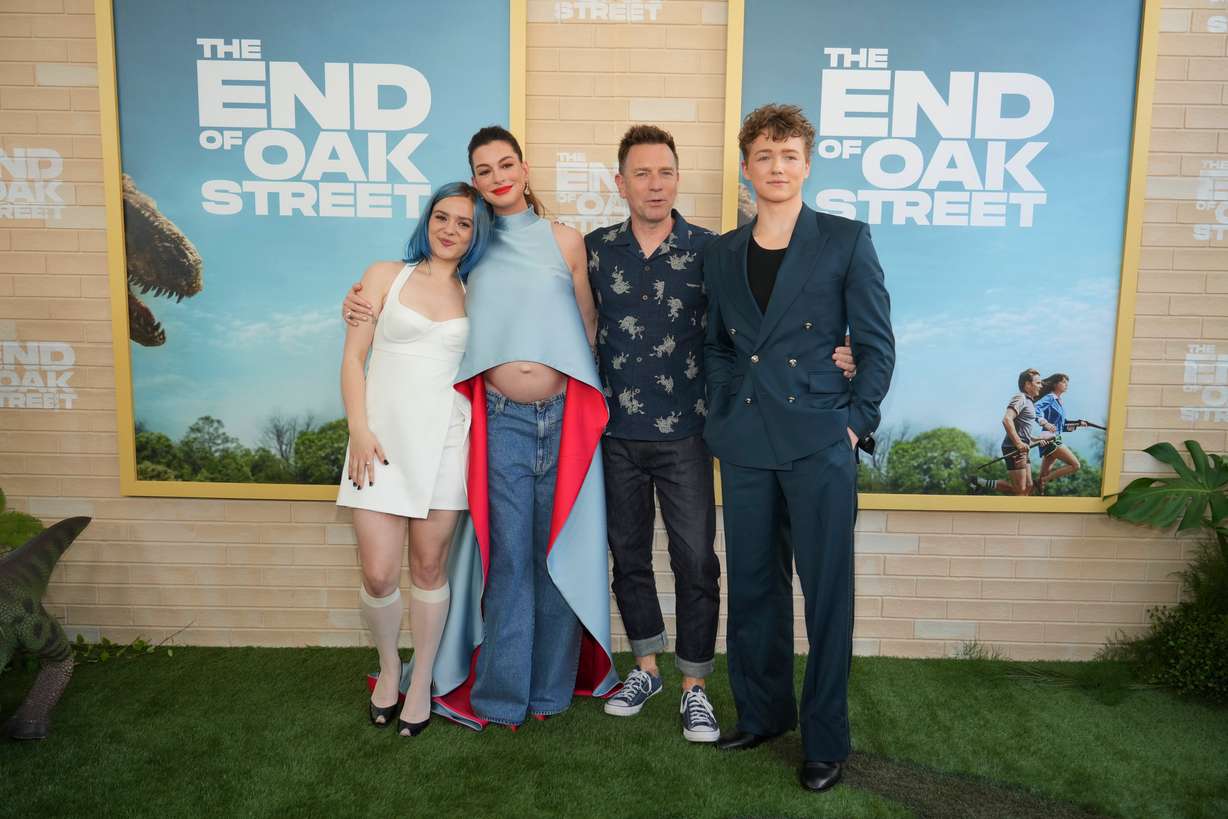Maisy Stella, from left, Anne Hathaway, Ewan McGregor and Christian Convery arrive at the premiere of "The End of Oak Street" on Aug. 9, at Warner Bros. Studios in Burbank, Calif.