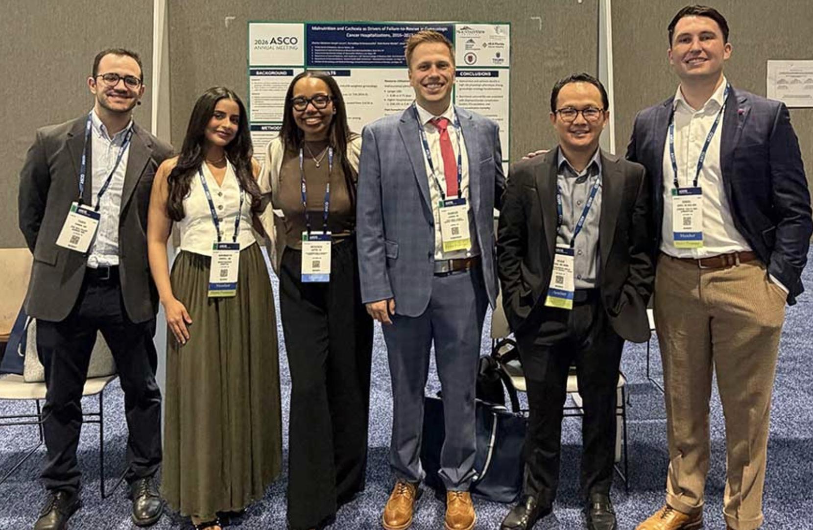 Daniel Thomas Jones, DO, MBA, MHS, with members of his oncology research team at the 2026 ASCO Annual Meeting in Chicago, where the group presented research in cancer outcomes and health services research.