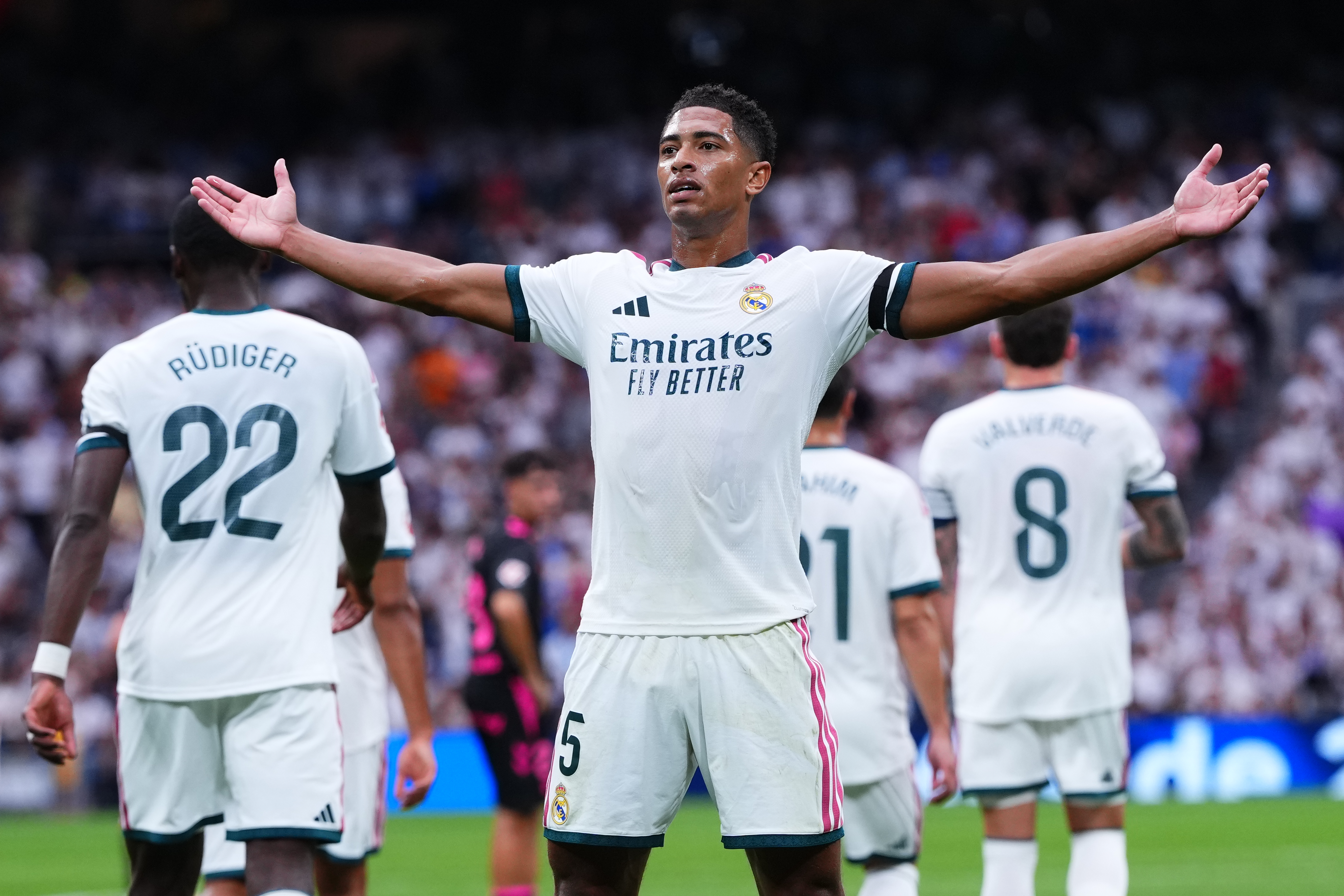 Real Madrid's Jude Bellingham celebrates after Malaga's own goal during the La Liga soccer match between Real Madrid and Malaga in Madrid, Spain, Sunday, Aug. 30, 2026. 