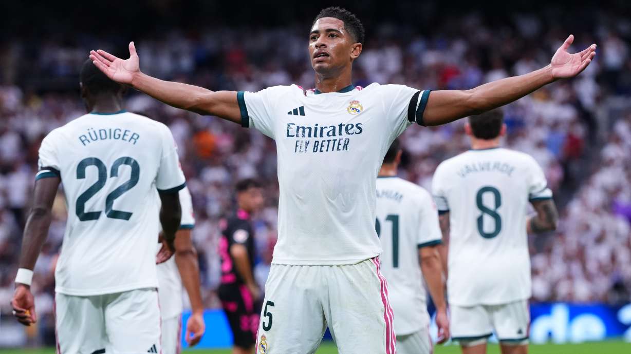 Real Madrid's Jude Bellingham celebrates after Malaga's own goal during the La Liga soccer match between Real Madrid and Malaga in Madrid, Spain, Sunday, Aug. 30, 2026.